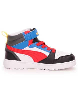 Tenis Puma para niño Rebound V6 Mid Ac Ps
